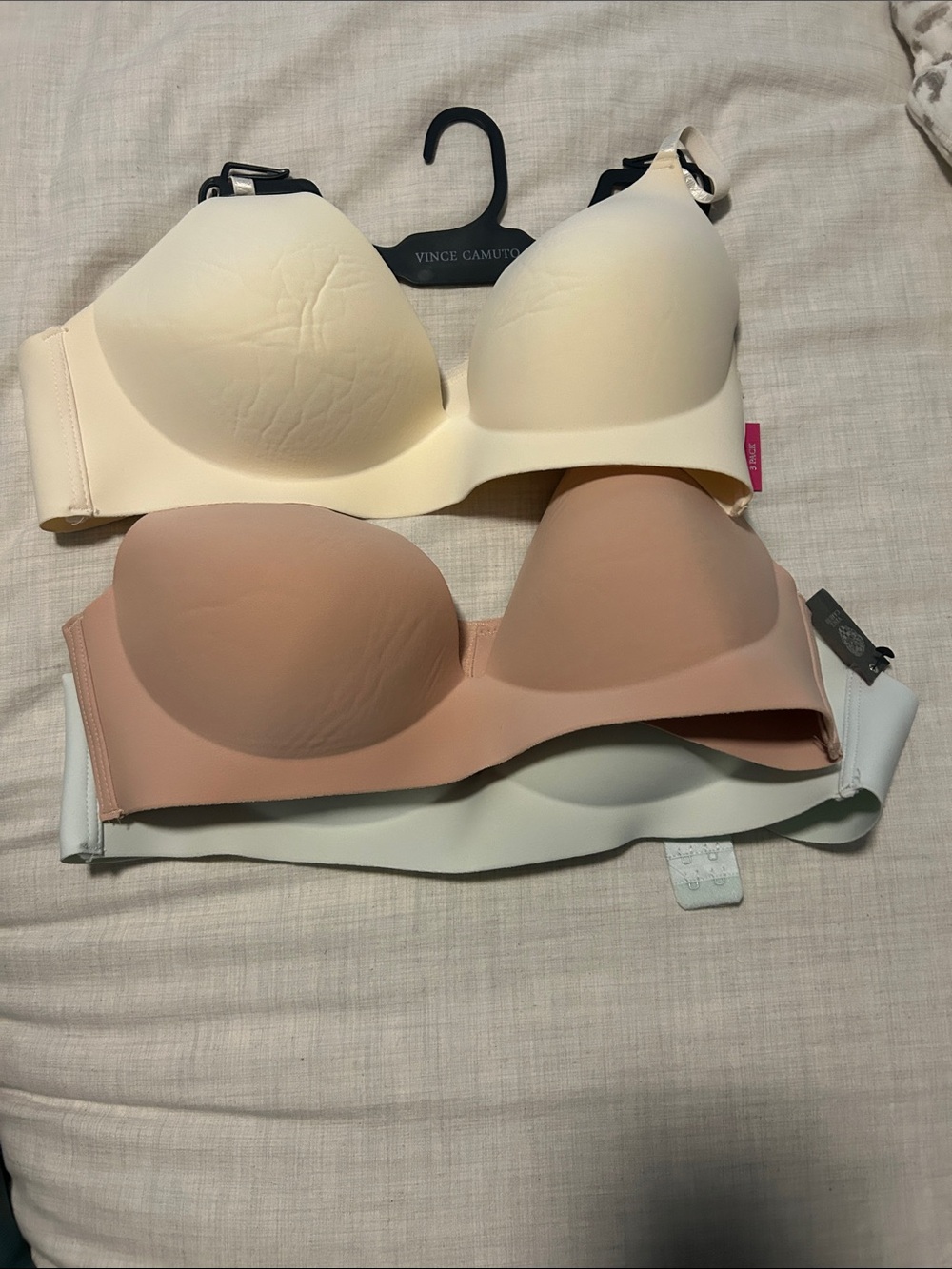 Vince Camuto Three-Piece Seamless T-Shirt Bras in Cream, tan, and blue